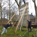 Het bord voor de kerk - achterkant